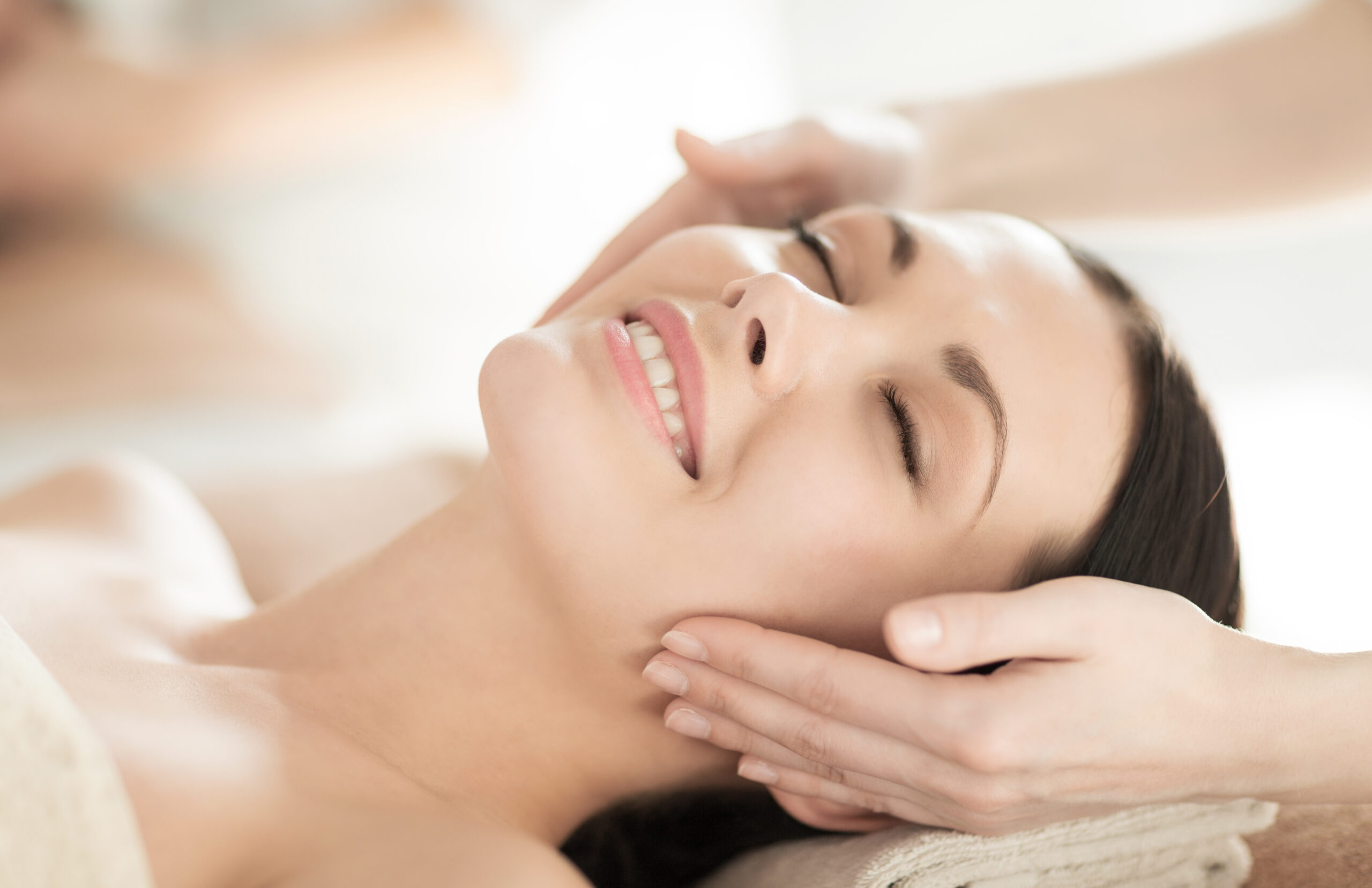 woman receiving a facial at encore medspa