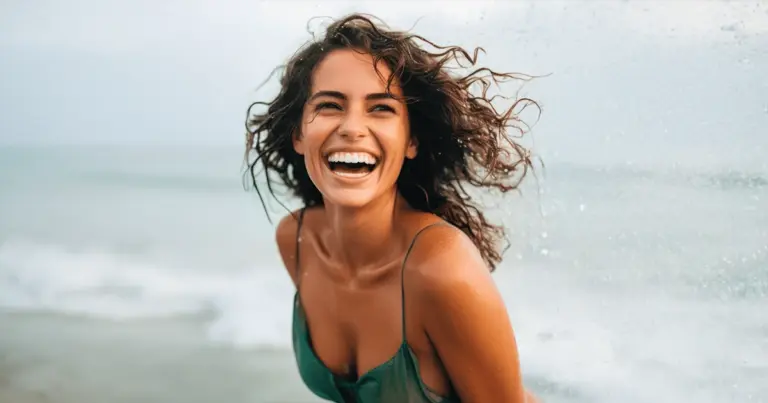 woman smiling at the beach,Home - Best MedSpa in Walnut Creek & Pleasanton